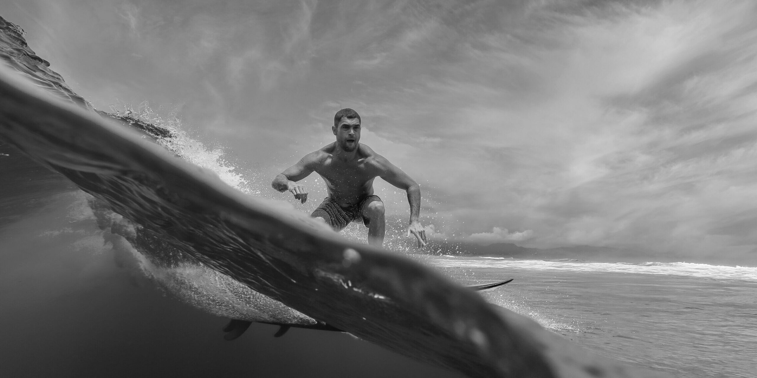 7. shirtless-male-surfer-on-a-wave-at-sunny-day-2022-12-07-00-27-54-utc