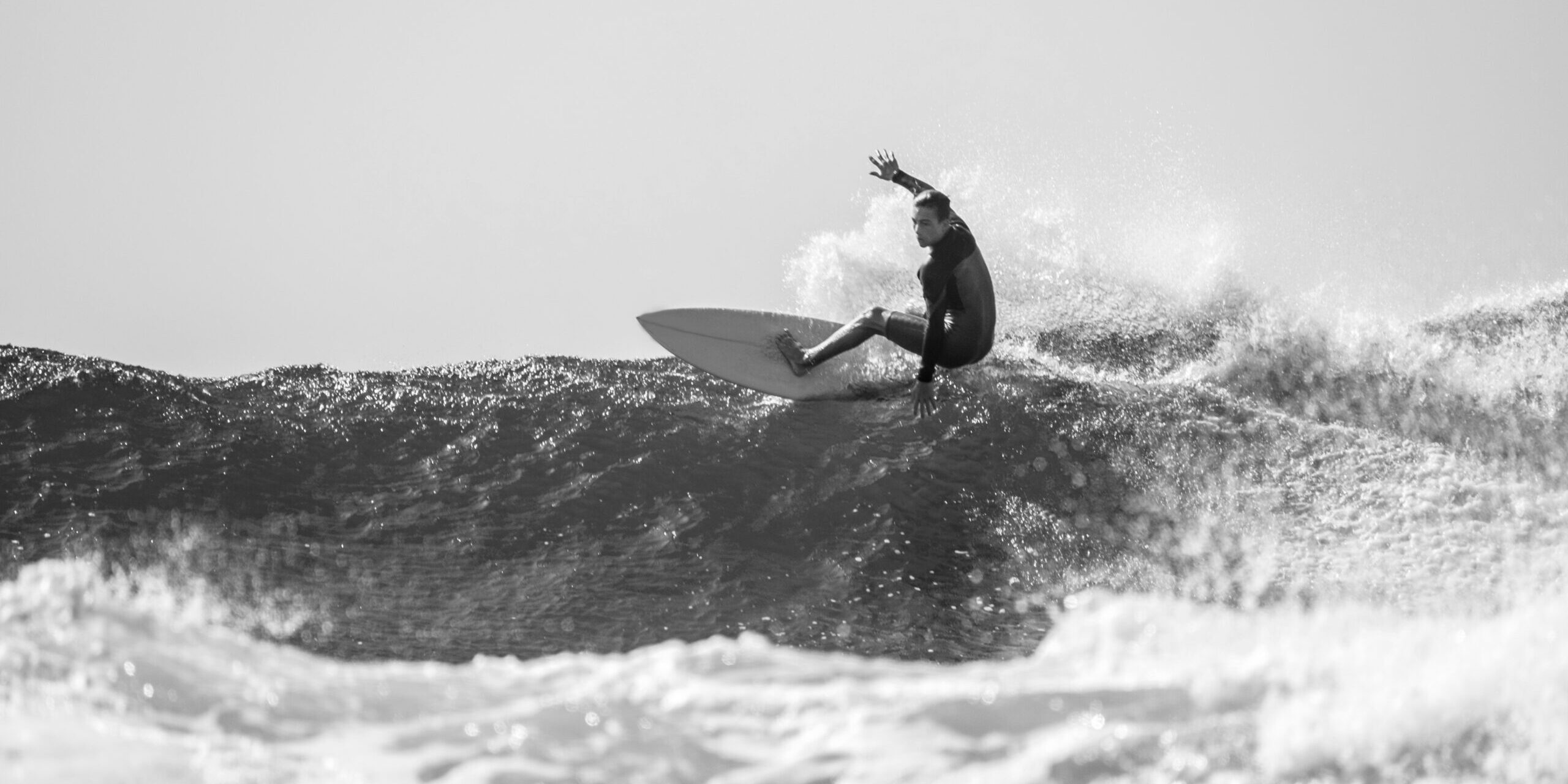15. teenager-surfing-at-the-wave-in-tenerife-playa-de-2022-02-03-11-16-46-utc
